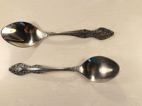 two metal tablespoons