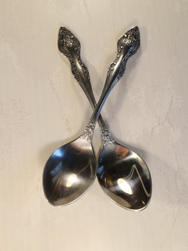 two metal tablespoons
