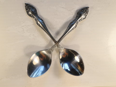 two metal tablespoons