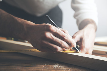 Close up Architect working on blueprint