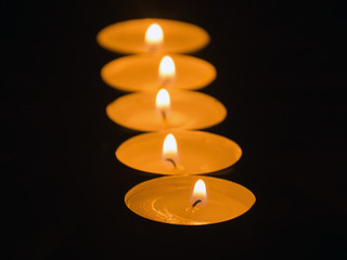 Light of candle flame.