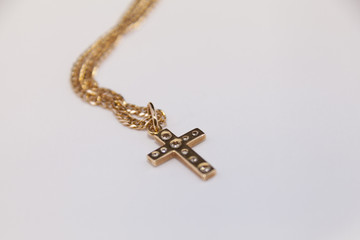 gold cross with diamonds