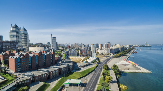 Aerial view on the modern and well-groomed Ukrainian city of Dnieper (Dnipropetrovsk) located on the bank of the big river.