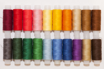 coils with colored thread