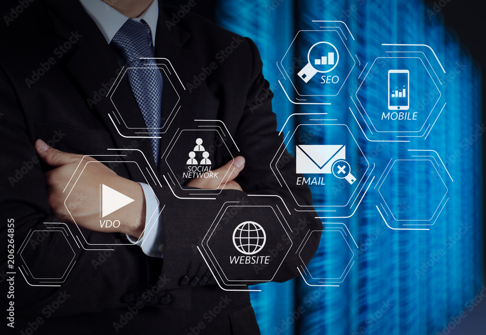 Aufkleber businessman hand using tablet computer and server room background