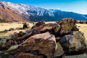 hill textured stones on the background of the Altai mountain valley. Altai mountains landscape