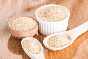 Raw Organic Amaranth grain on wooden table