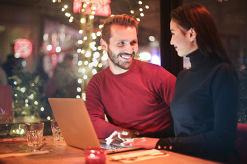 Couple using a laptop