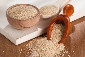 Raw Organic Amaranth grain on wooden table