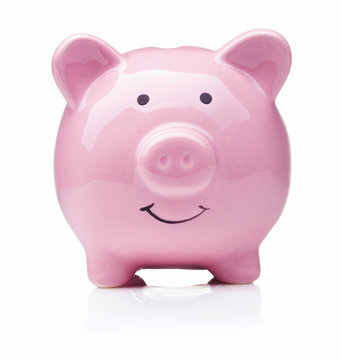 pink ceramic piggy bank isolated on white background