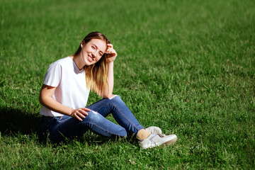 Fototapeta premium pretty young woman in a park.