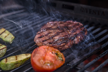 Steak Ribeye and Grille Vegetables Being Prepared in Josper