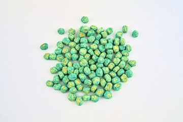 Dried pea seeds ready to plant. Close-up on a white background