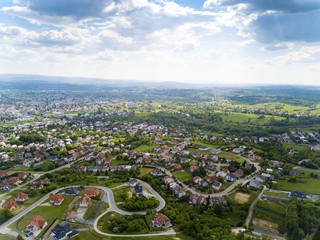 Panorama of the mestain near the town of Jaslo in Poland from a bird's eye view. Aerial photography of landscapes and settlements. Urbanization of the country. Living environment of people. 