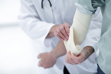 closeup.doctor applying elastic bandage