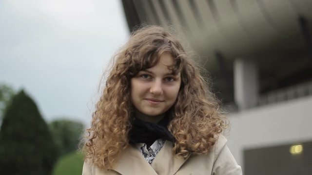 Portrait of Young Woman on Traffic.