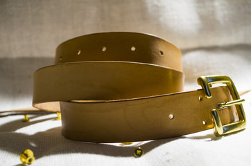 The production of leather belt. Leather belt.