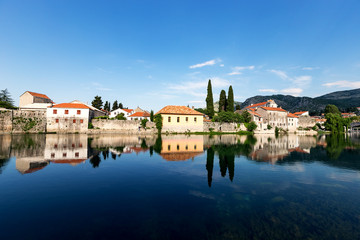 Fototapeta na wymiar View of Trebinje old town with reflection in river