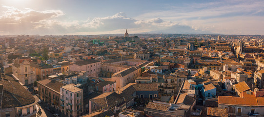 Beautiful aerial view of the Catania city on Sicily from above with Etna volcano visible on the...