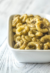 Bowl of pasta with pesto sauce