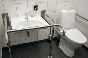 Handicapped Access Bathroom with Grab Bars and a Toilet