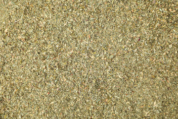 Dried parsley as background, top view