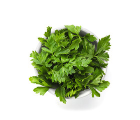 Bowl with fresh green parsley on white background, top view