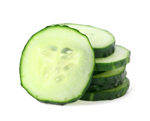 Slices of fresh cucumber on white background