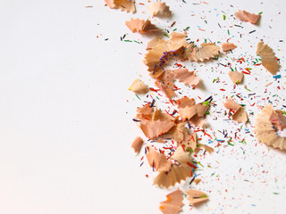 Colorful pencil shavings and pieces on white isolated background. - Powered by Adobe