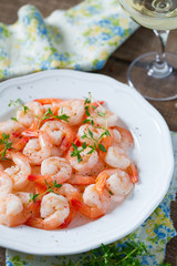 boiled shrimps on wooden surface