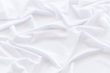 Crumpled of white satin for abstract and design, Detail and grooved of fabric for background and textured