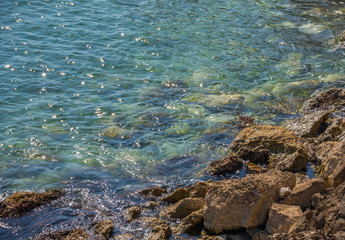 Amazing sea with blue summer wave and rocks, relaxing view of rocks and water