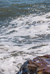 Amazing sea with blue summer wave and rocks, relaxing view of rocks and water