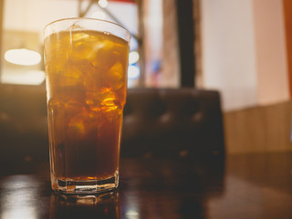 Water glass on a wooden table