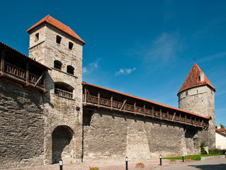 Ancient city walls and watchtowers in Tallinn, Estonia © ellenmck