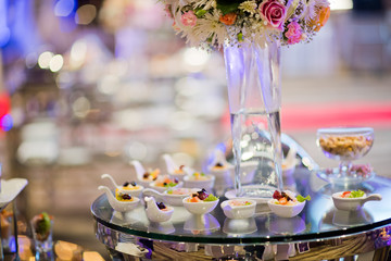 Glass shots pastry, wedding catering food, mini canapes food, tasty dessert, Beautiful decorate catering banquet table,  snacks and appetizers, wedding celebration