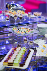 Glass shots pastry, wedding catering food, mini canapes food, tasty dessert, Beautiful decorate catering banquet table,  snacks and appetizers, wedding celebration