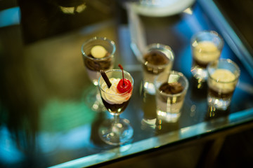 Glass shots pastry, wedding catering food, mini canapes food, tasty dessert, Beautiful decorate catering banquet table,  snacks and appetizers, wedding celebration