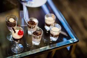 Glass shots pastry, wedding catering food, mini canapes food, tasty dessert, Beautiful decorate catering banquet table,  snacks and appetizers, wedding celebration