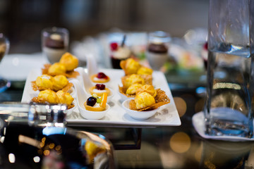 Glass shots pastry, wedding catering food, mini canapes food, tasty dessert, Beautiful decorate catering banquet table,  snacks and appetizers, wedding celebration