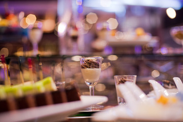 Glass shots pastry, wedding catering food, mini canapes food, tasty dessert, Beautiful decorate catering banquet table,  snacks and appetizers, wedding celebration