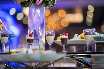 Glass shots pastry, wedding catering food, mini canapes food, tasty dessert, Beautiful decorate catering banquet table,  snacks and appetizers, wedding celebration