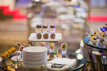 Glass shots pastry, wedding catering food, mini canapes food, tasty dessert, Beautiful decorate catering banquet table,  snacks and appetizers, wedding celebration
