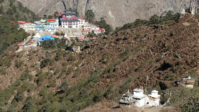 Prayer Stupas and flags on the background of Tengboche Buddhist temple at Solu Khumbu valley, Nepal, Himalayas.