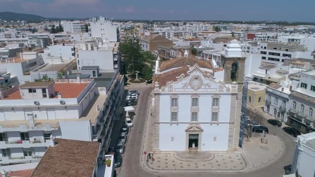 Aerial of Church Nossa Senhora do Rosario in the typical town of Olhao, Algarve tourism destination region.