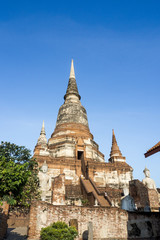 Fototapeta premium Big and old pagoda : Wat Yai Chaimongkol Ancient temple Ayutthaya, Thailand that very famous for tourist