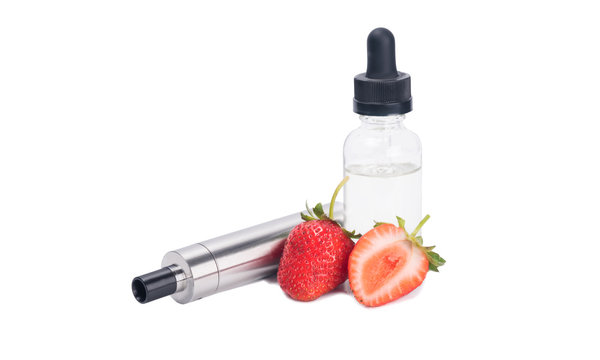 liquid in bottle for electronic cigarette and strawberry on white background