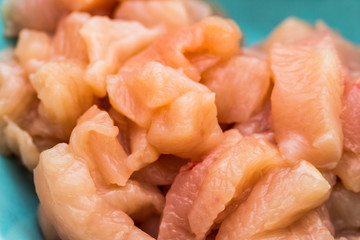 Small pieces of chicken breast in the bowl