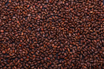 Pine nuts in shells as a background Copy space Top view