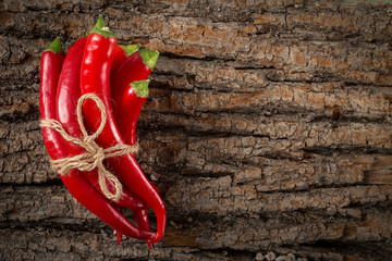 Red hot chili peppers tied with rope